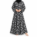 Black full-length abaya with an all-over white floral print and long sleeves