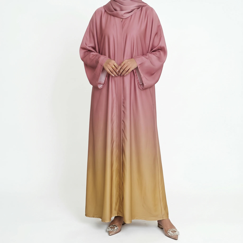 Dusty pink and beige ombre abaya with wide sleeves and matching pink headscarf