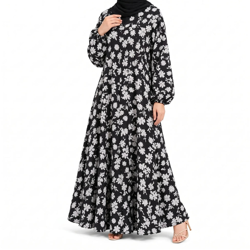 Black full-length front open abaya with an all-over white floral print and long sleeves