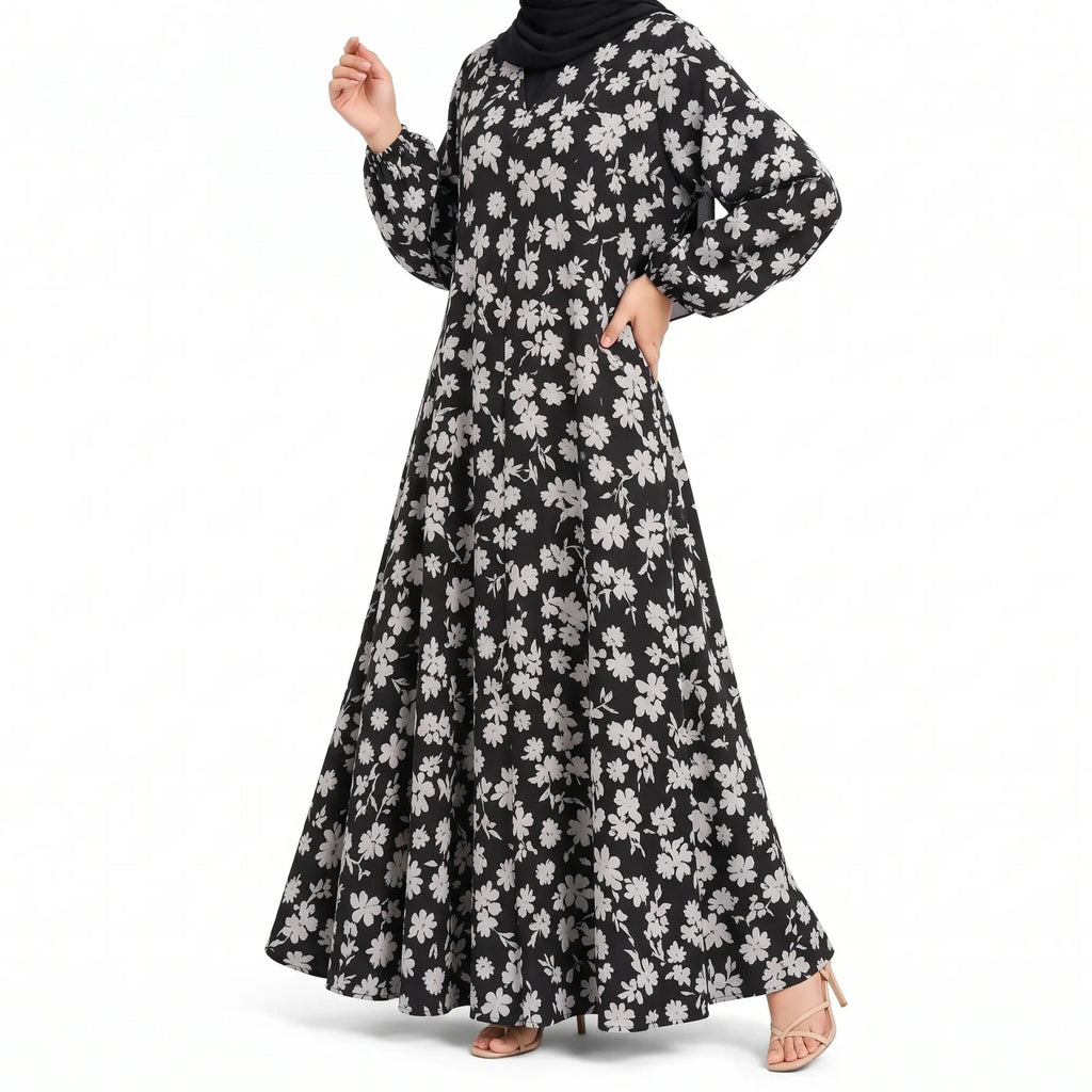 Black full-length front open abaya with an all-over white floral print and long sleeves