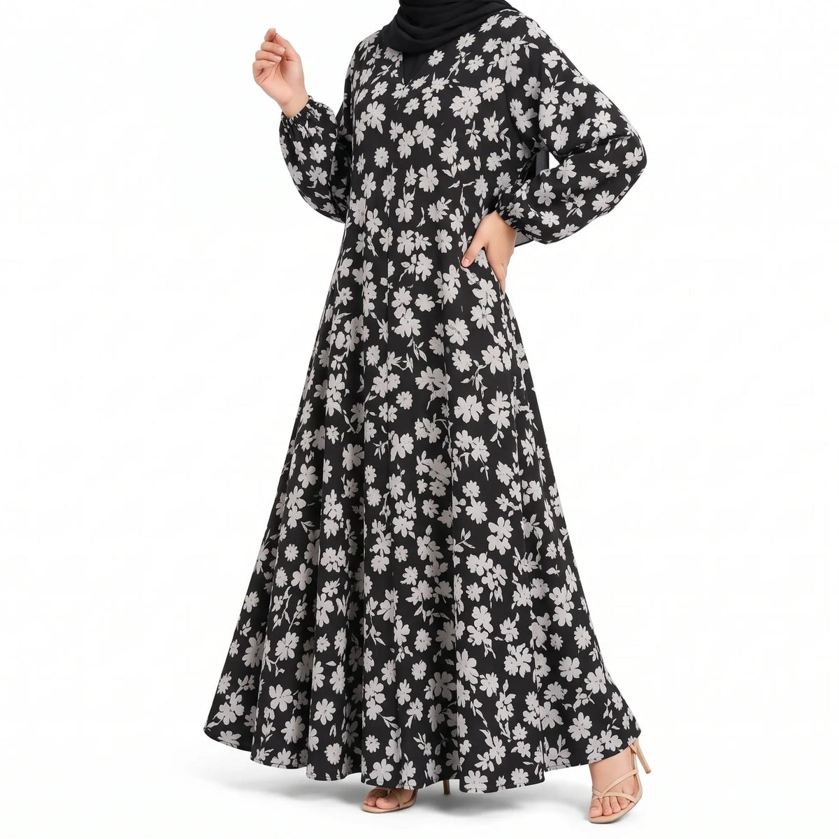 Black full-length front open abaya with an all-over white floral print and long sleeves