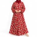 Petal Whirl Abaya featuring a red base, swirling green and cream motifs, and a full-length silhouette with open front